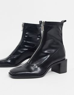 ankle boots with zip detail in black