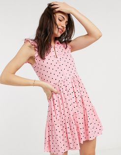 sleeveless shirt dress in pink polka dot