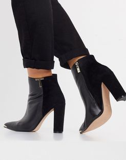 Qinala heeled ankle boot with T branding detail in black