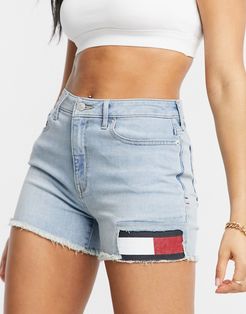 distressed denim shorts with flag detail in light wash-Blues
