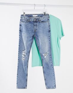 stretch skinny jeans with blowout rips in light blue wash-Blues