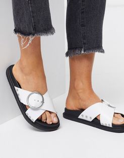 buckle flat sandals in white