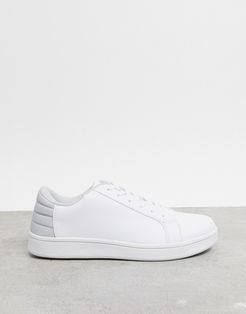 lace up sneakers in white with gray heel