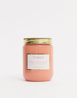 candle with tired slogan-Orange