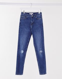 high waisted skinny jean with knee rips in mid wash-Blue