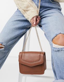 leather cross-body bag with gold clasp in tan-Brown