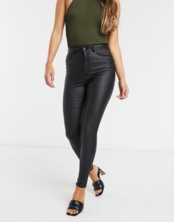 coated skinny jeans with high rise in black