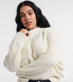 sweater with roll neck and pearl trim in cream