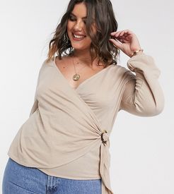 wrap front blouse with tortoise buckle in beige