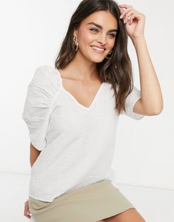 textured top with ruched sleeve in white