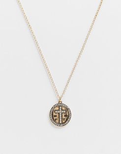 necklace in gold with oval pendant and crystal cross engraving