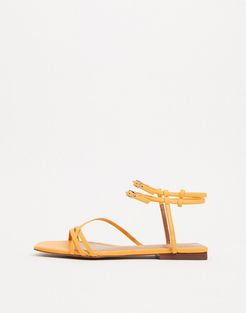 Ivy spaghetti strap flat sandals in yellow leather-Orange