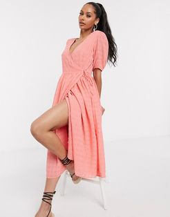 wrap midi dress with puff sleeve in textured peach-Pink
