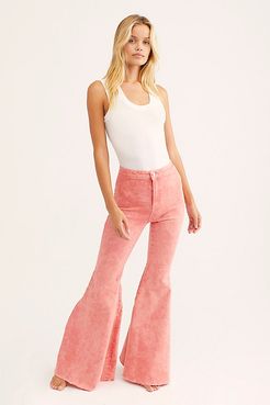 Just Float On Flare Jeans by We The Free at Free People, Prairie Pink, 32