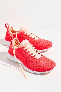 Techloom Phantom Trainer by APL at Free People, Magenta / Neon Peach / White, US 8