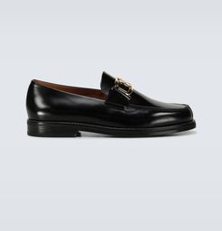 Swan loafers with logo buckle