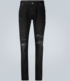 Slim-cut ripped cotton jeans