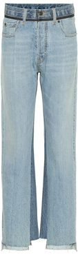 High-rise asymmetric jeans