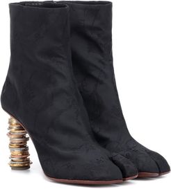 Split-toe coin ankle boots