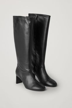 KNEE HIGH HEELED LEATHER BOOTS