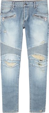 Light blue distressed slim-leg jeans