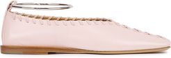 Light pink whipstitched leather flats