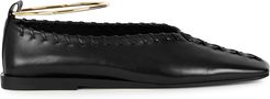 Black whipstitched leather flats