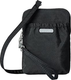 Legacy Bryant Pouch (Black/Sand) Cross Body Handbags