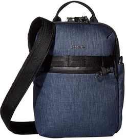 Metrosafe X Vertical Anti-Theft Crossbody Bag (Dark Denim) Handbags