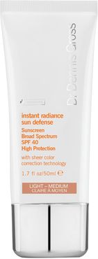 Instant Radiance Sun Defense Sunscreen Broad Spectrum Spf 40 - Light Med