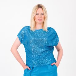 Blusa in tulle con paillettes