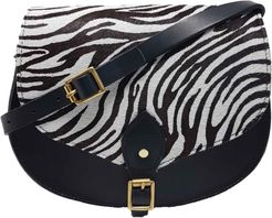 Alexandra Zebra Print Leather Saddle Bag In Black With Back Pocket