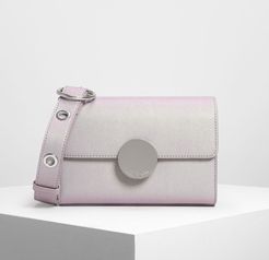 Circular Push Lock Crossbody Bag