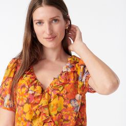 V-neck ruffle top in sunset floral
