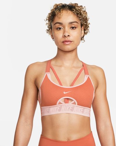 Bra imbottito a sostegno leggero con spalline incrociate Nike Dri-FIT Indy UltraBreathe - Donna - Arancione