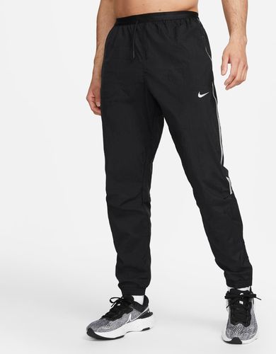 Pantaloni da running per le stagioni intermedie Nike Repel Run Division – Uomo - Nero