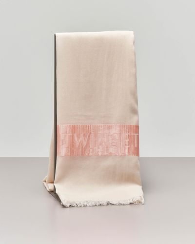 "Stola color avorio in misto cotone e modal e fascia scritta logo"