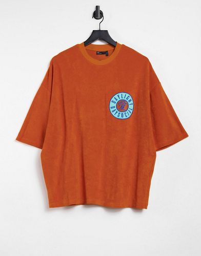 ASOS Daysocial oversized T-shirt in orange terry with badge