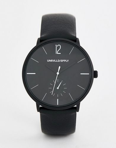 monochrome watch with black faux leather strap