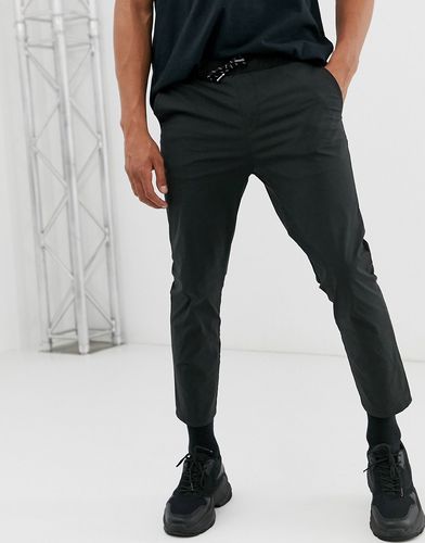 Pantaloni slim in nylon neri-Nero