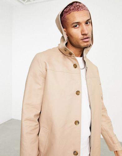 shower resistant hooded trench coat in stone