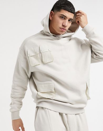 oversized hoodie in beige with utility pockets - part of a set-Neutral