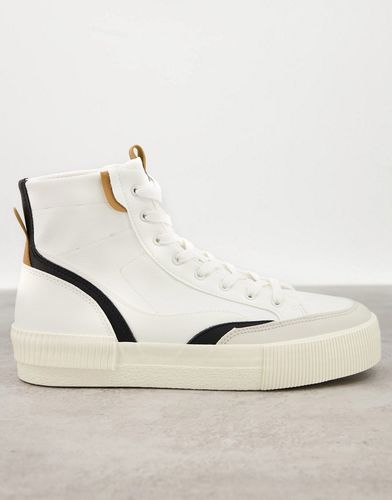 hi top sneakers in white with black detailing