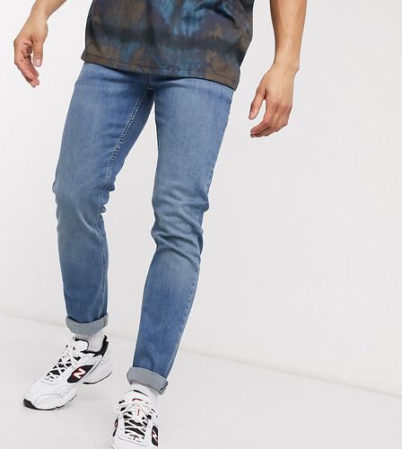 x001 skinny jeans in blue mid wash