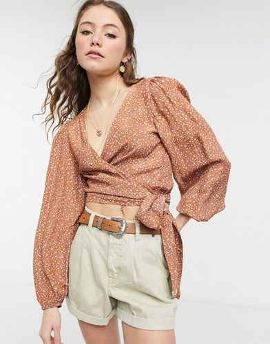 Cotton: On puff sleeve wrap blouse in peach floral-Black