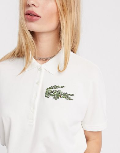 embroidered logo boxy polo shirt in cream