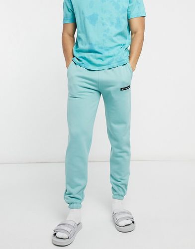 Aftermath sweatpants with rubber logo in blue-Blues