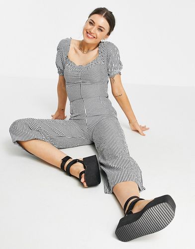 Nala - Tuta jumpsuit con scollo a cuore a quadretti neri-Nero