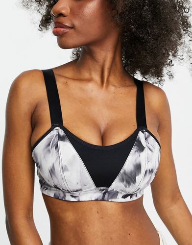 Coppe Grandi - Energy - Reggiseno sportivo nero leggermente imbottito convertibile a fiori monocromatici