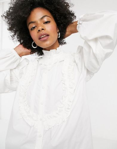 ruffle detail blouse in white